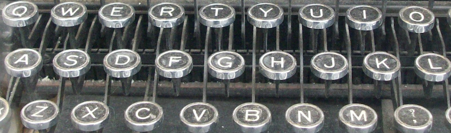 Typewriter keyboard which forms the Media Helping Media logo